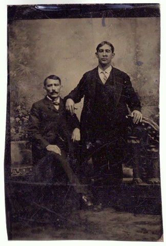 Studio portrait of two gentlemen