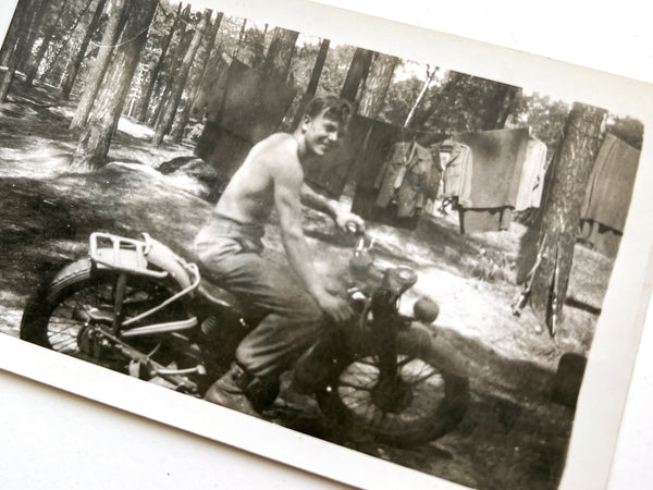 Snapshot of a shirtless man on a motorcycle, U.S. Army Soldier (WWII, Harley Davidson?)