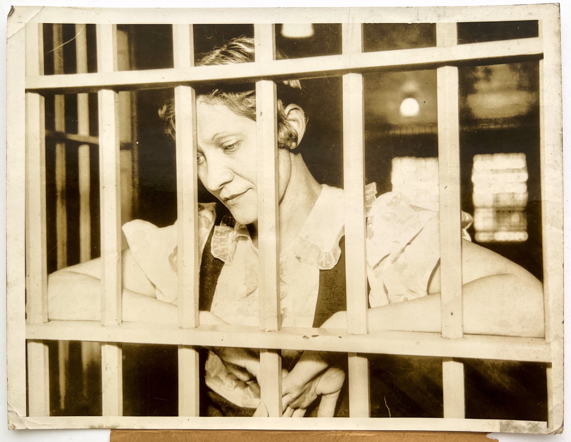 Press Photograph of Mrs. Bessie Opas, conspired to kill her husband ("Woman Behind Bars")