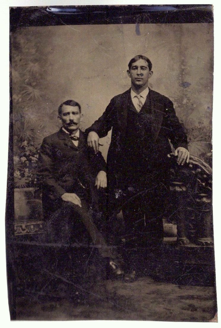 Studio portrait of two gentlemen