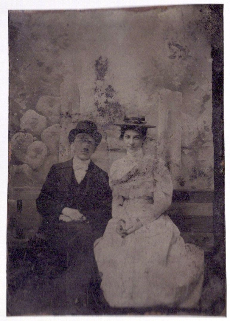 Tintype portrait of a reserved man and woman (photograph)
