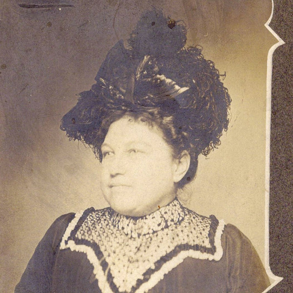 Artful portrait of a woman with a great hat (cabinet card photograph)