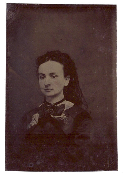 Tintype portrait of a young woman in mourning