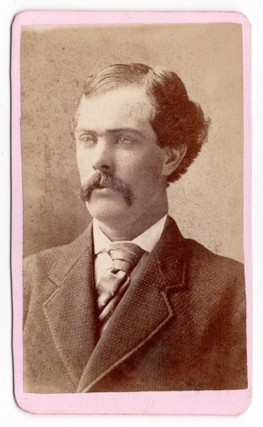 Cabinet card and CDV of two wide-eyed men