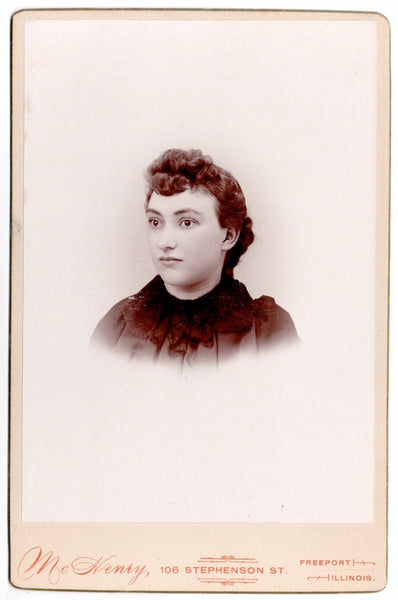 Cabinet cards of two women with their eyes