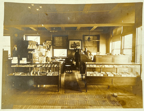 Large photograph inside the W. W. Waltke Co., St. Louis ca. 1900, soap displays and working women