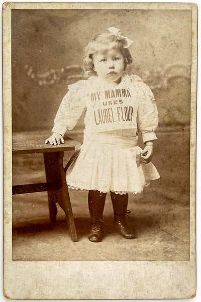 Cabinet card photograph of a child advertising Laurel Flour