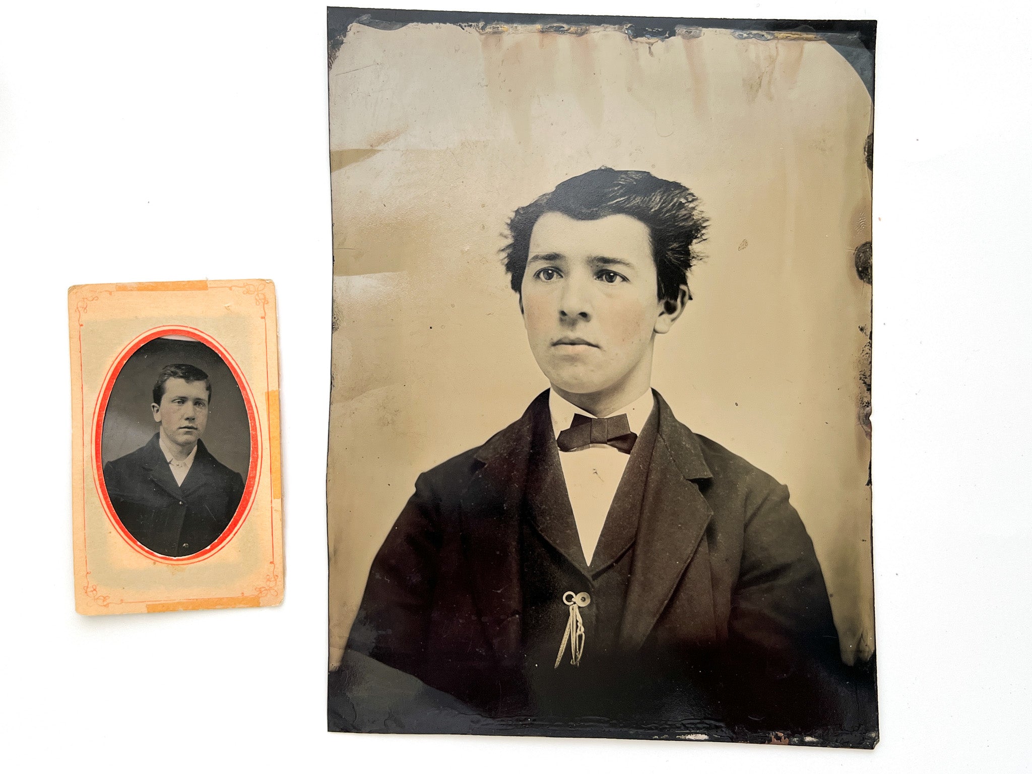 Two tintype portraits of boys with rosy cheeks