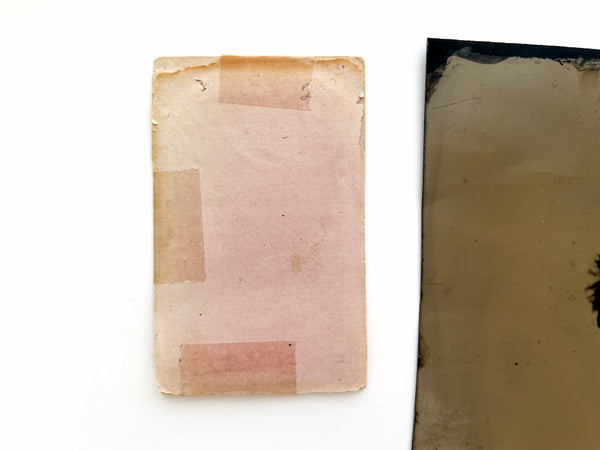 Two tintype portraits of boys with rosy cheeks