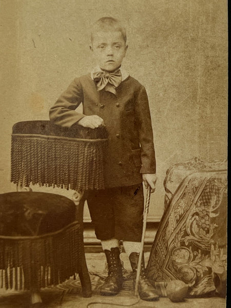 Tintype of a girl and CDV of a boy holding --