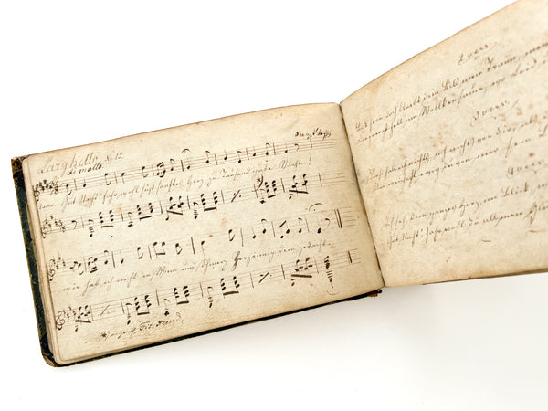 Manuscript liederbuch with three taufbriefe kept by South Bend immigrant Gottfried Poehlman