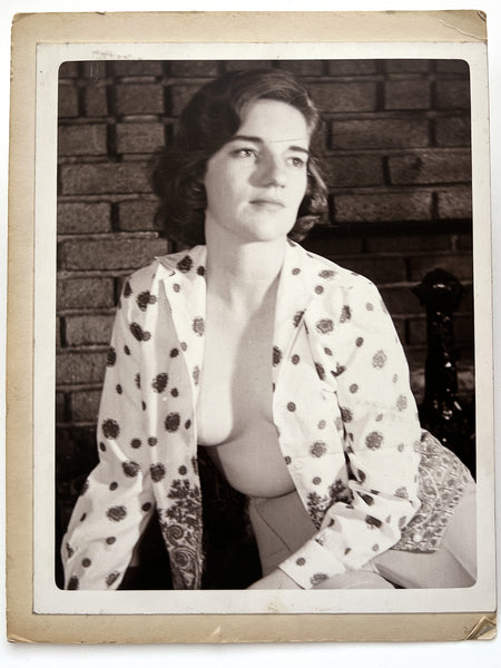 12 photographs of the same woman in various stages of enthusiasm and undress