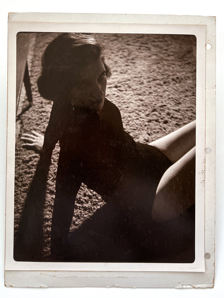 12 photographs of the same woman in various stages of enthusiasm and undress