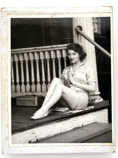 12 photographs of the same woman in various stages of enthusiasm and undress