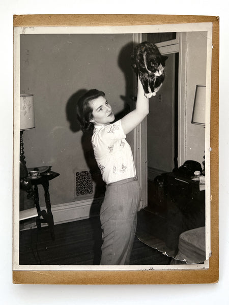 12 photographs of the same woman in various stages of enthusiasm and undress