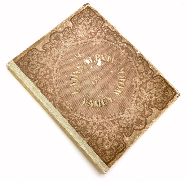 The Lady's Album of Fancy Work; Consisting of novel, elegant and useful designs in knitting, netting, crochet and embroidery with clear and explicit directions for working the patterns.