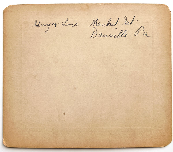 Two children and a sled, ca. 1900