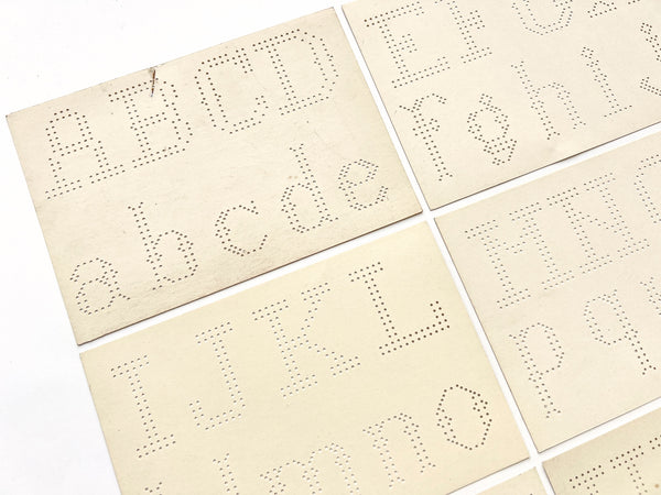 Six alphabet lacing cards