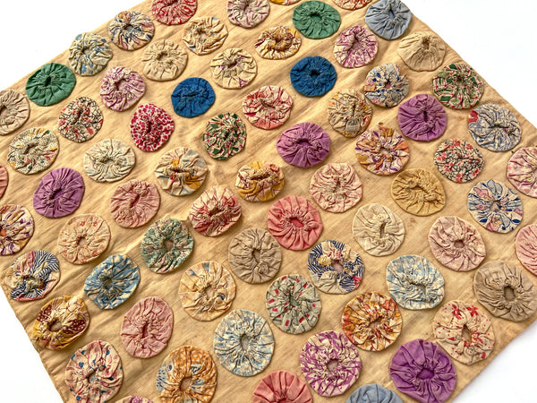 Yoyo stitched fabric cover, ca. 1930