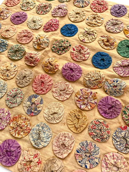 Yoyo stitched fabric cover, ca. 1930