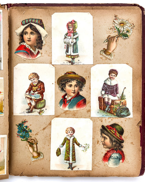 Ca. 1880s scrap book with trade cards, die cuts, chromos, etc.