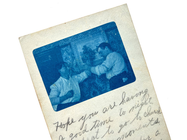R.P.P.C. cyanotype of two pretend pugilists sticking "em" up in someone's house