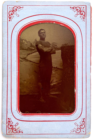 Tintype of a man looking tough in a bathing costume