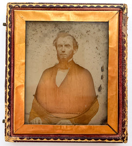 Intriguingly damaged sixth plate ambrotype of Augustus Blakesley in full case