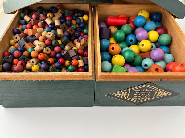 Mrs. Hailmann's Beads #470 (Two sets of wooden beads cubes, spheres, cylinders in original wood boxes)