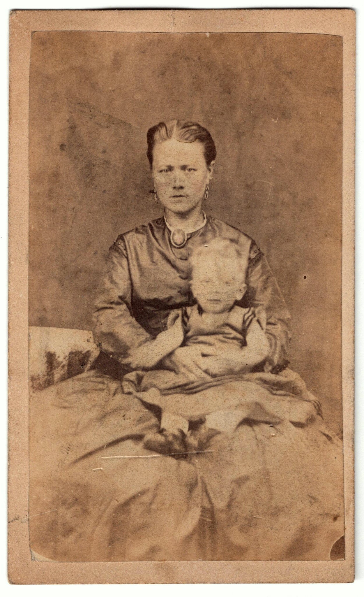 Photograph of a woman & child