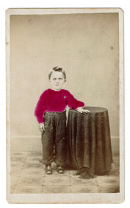 Cabinet photograph of a nonplussed Victorian boy